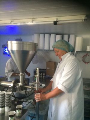 Riggs suggested a machine which could efficiently fill its ice cream into pots because the company's hand-filling process had been time-consuming and labour intensive.